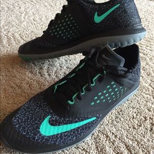 Women’s size 10 Nike black cheetah print with mint